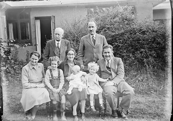 old black and white photo showing 3 generations unknown family reunion