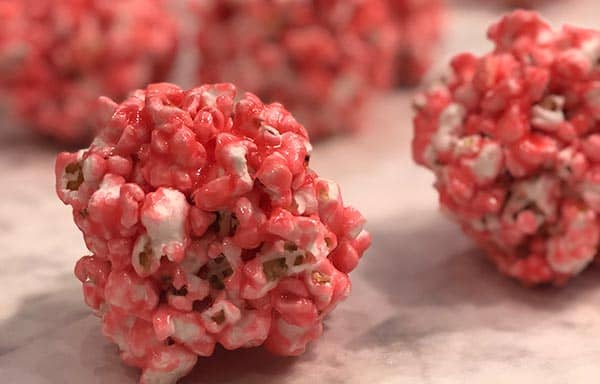 closeup picture of red popcorn balls honoring old family traditions